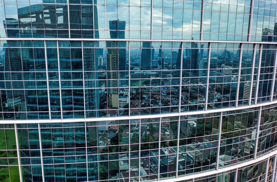 Modern glass office building well suited for motorized roller blinds