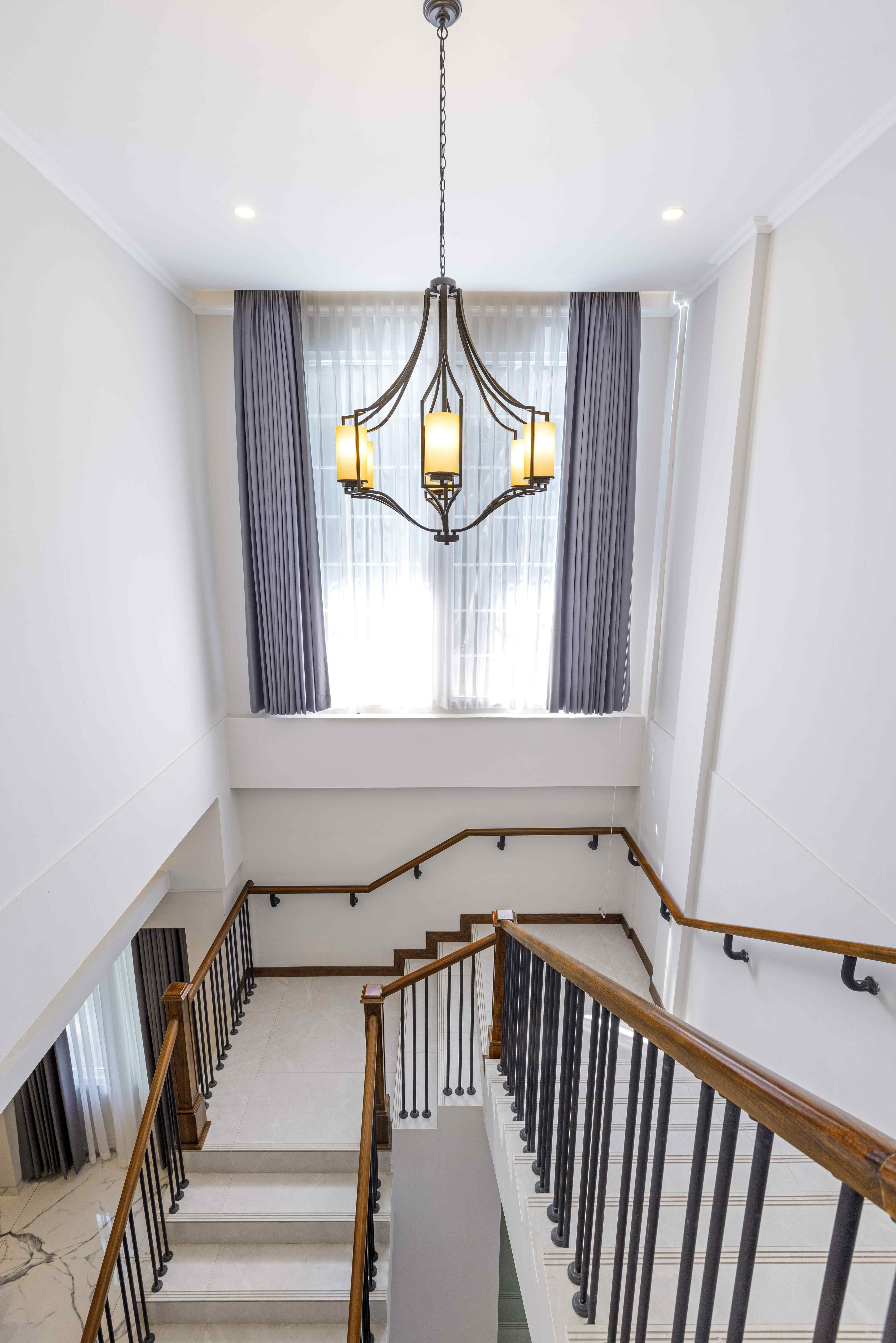 Floor-to-ceiling MOWIN drapes and sheers in an official residence