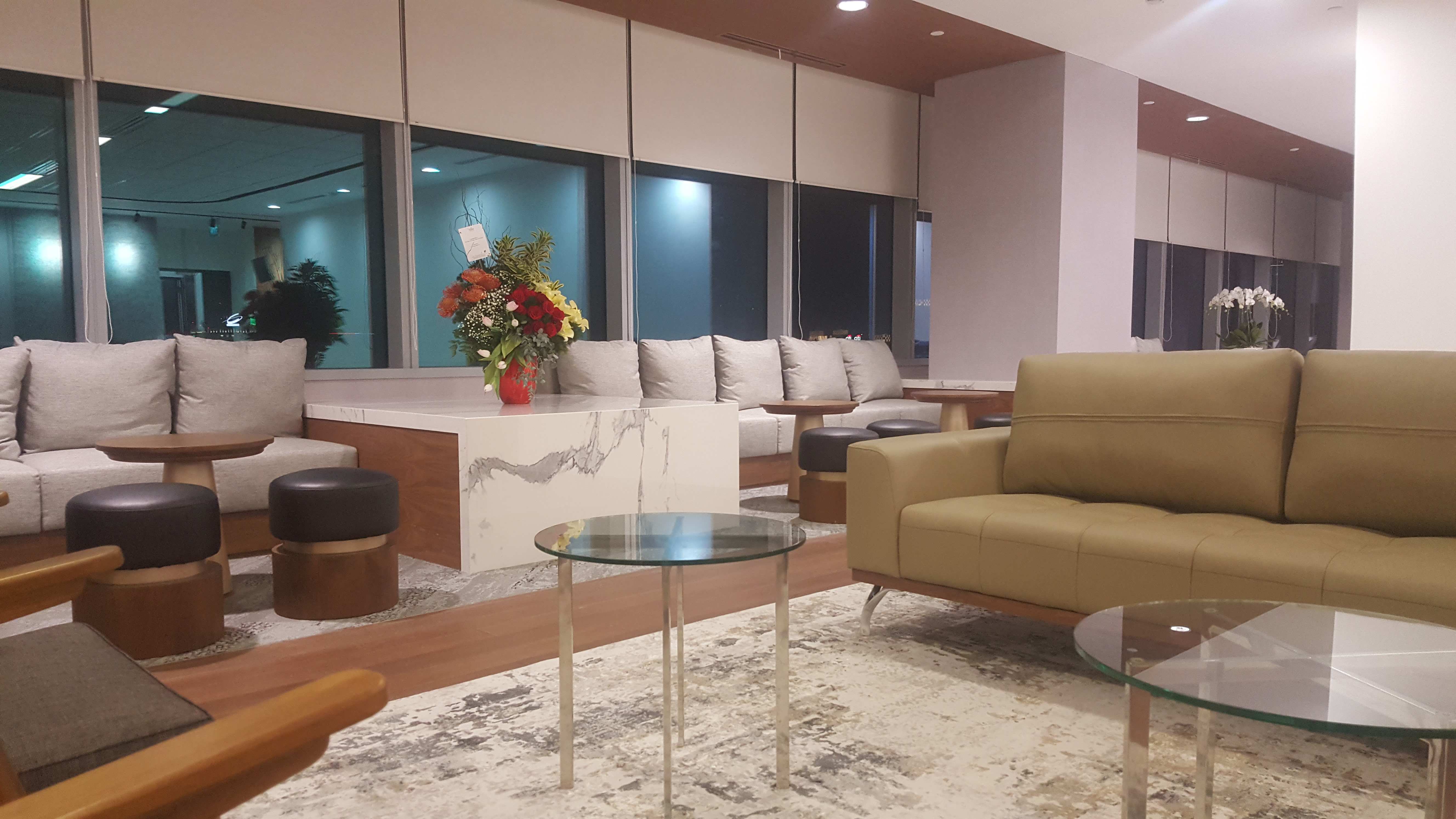 Motorized blinds in a modern commercial lobby